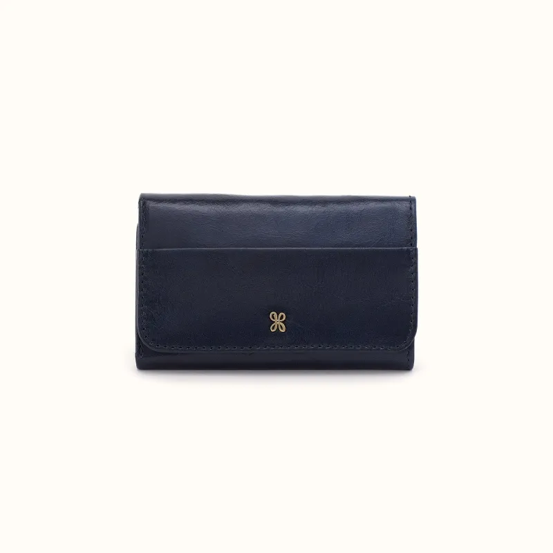 Jill Trifold Wallet In Polished Leather - Ink Navy made by HOBO