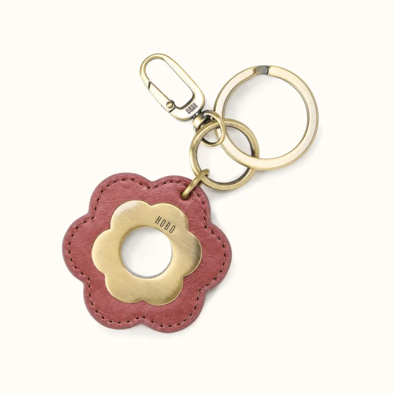Daisy Keychain In Polished Leather - Rosewood made by HOBO