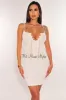 White Shimmery Spaghetti Strap Gold Chain Lace Up Mini Dress sold by Hot Miami Styles