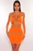 Tangerine Spaghetti Straps Knotted Cut Out Mini Dress sold by Hot Miami Styles