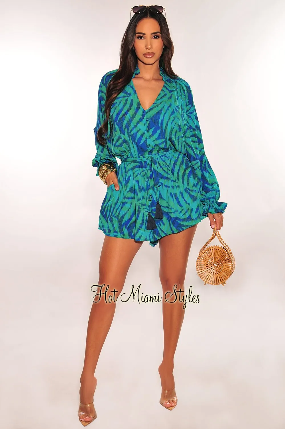 Blue Green Palm Print Long Sleeve Button Up V Neck Belted Romper sold by Hot Miami Styles product image thumbnail 3