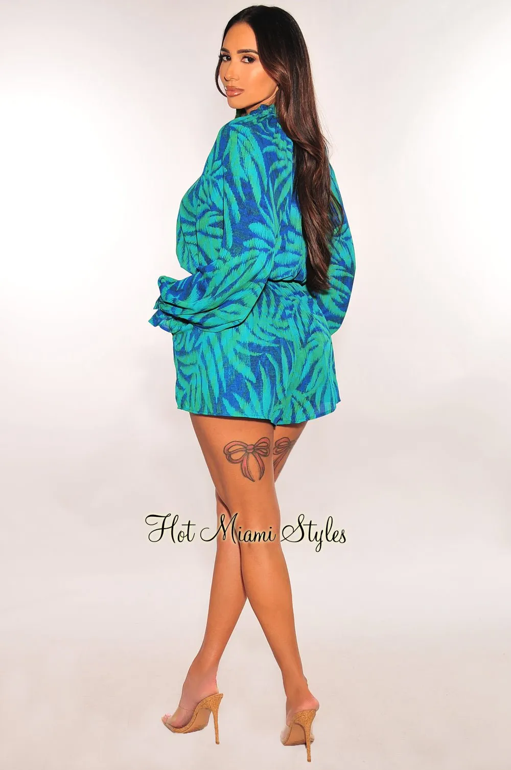 Blue Green Palm Print Long Sleeve Button Up V Neck Belted Romper sold by Hot Miami Styles product image thumbnail 4