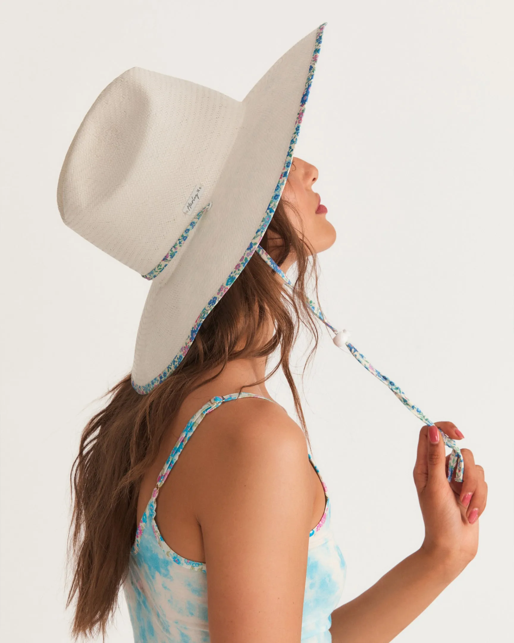 LoveShackFancy X HURLEY Floral Trim Straw Hat in Black and Natural LoveShackFancy x Hurley - Straw Lifeguard Hat | Parallel main image 2