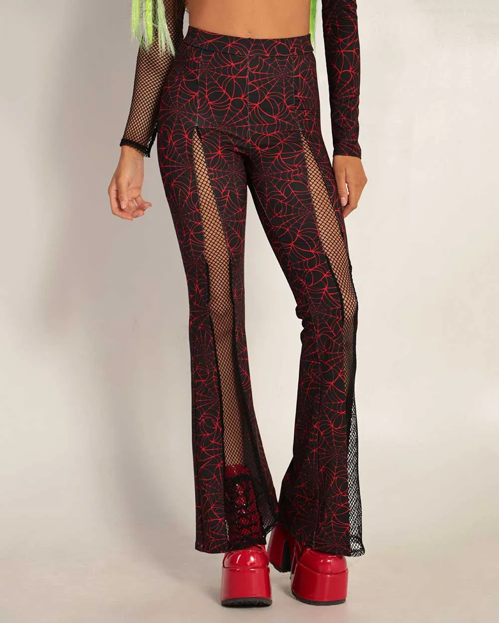 Venomous Vengeance Fishnet Bell Bottoms sold by iHeartRaves