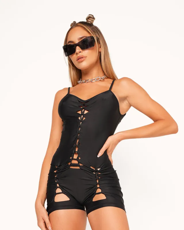 Dance in the Dark Braided Romper sold by iHeartRaves