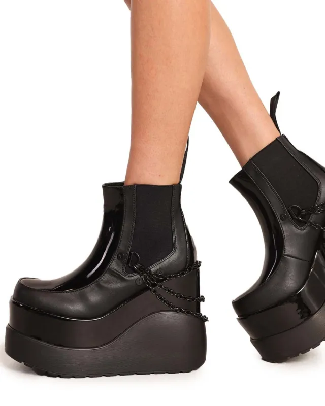 Demonia Boss Bish Platform Boots sold by iHeartRaves