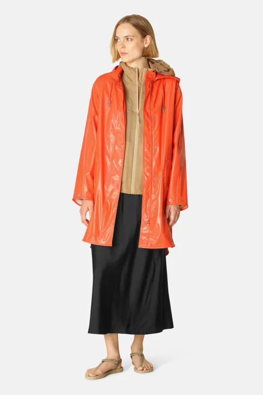 Long Raincoat - Hot Orange sold by Ilse Jacobsen