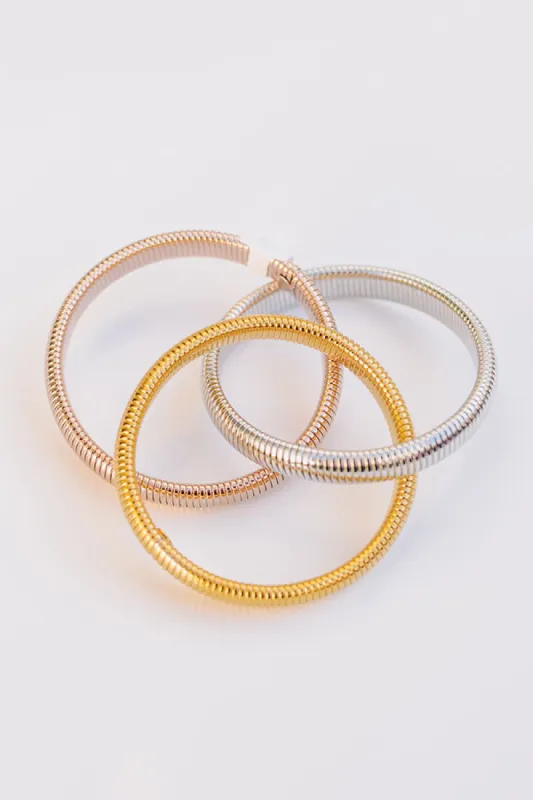 Mixed Rose Gold Twisted Cobra Bangle Bracelets sold by Impressions