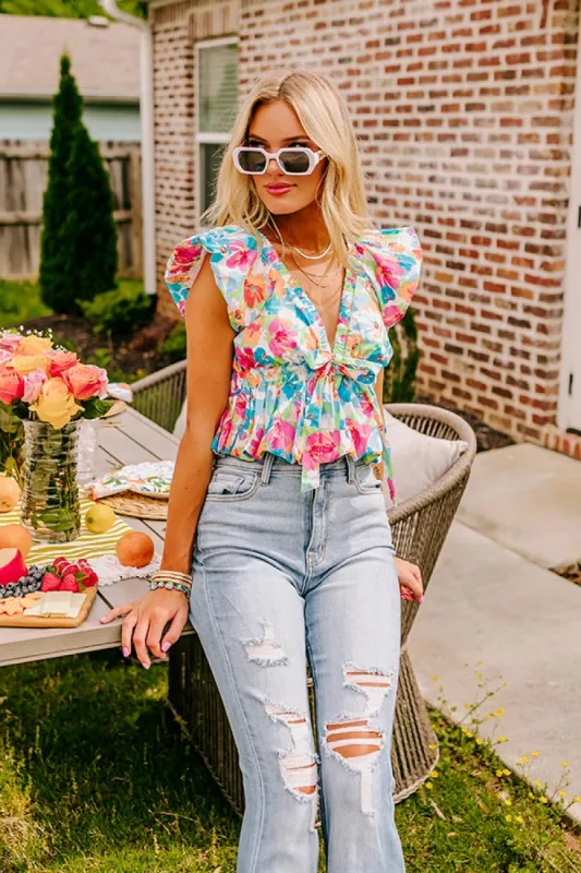 Feeling Chic Floral Peplum Top sold by Impressions
