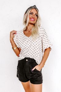 Play It Up Polka Dot Shift Top sold by Impressions
