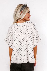 Play It Up Polka Dot Shift Top sold by Impressions