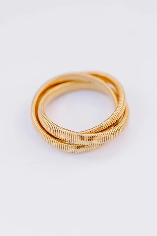 Gold Twisted Cobra Bangle Bracelets sold by Impressions