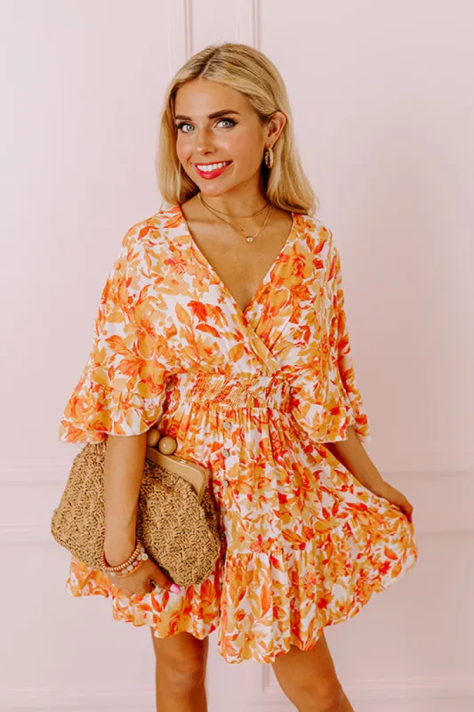 Love The Journey Floral Romper In Orange sold by Impressions