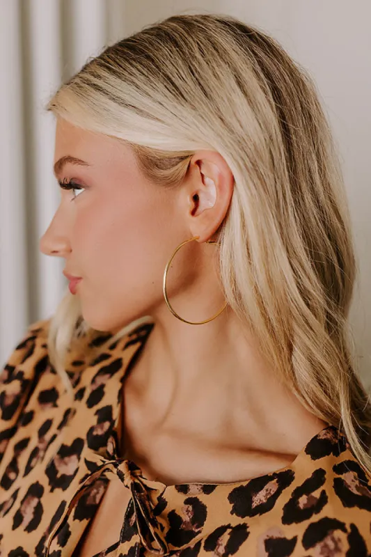 Cue The Chic Hoop Earrings sold by Impressions