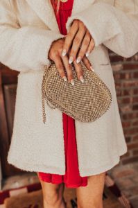 Champagne Getaway Rhinestone Clutch In Gold sold by Impressions
