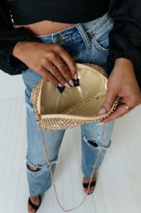 Champagne Getaway Rhinestone Clutch In Gold sold by Impressions