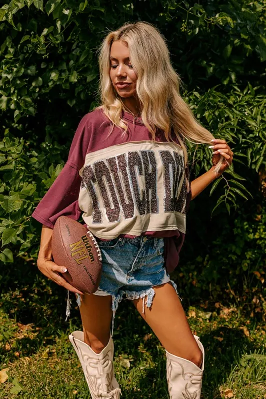 It's a Touch Down Sequin Oversized Tee in Garnet sold by Impressions
