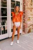 Stay Here Awhile Peplum Top In Rust sold by Impressions