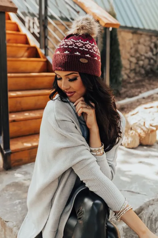 Colorado Cutie Faux Fur Pom Beanie in Maroon sold by Impressions