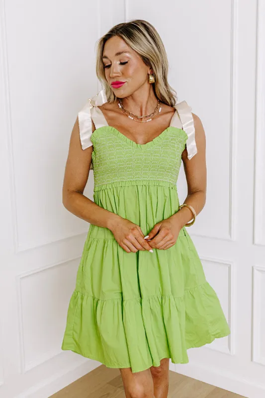 Total Crush Smocked Mini Dress in Lime sold by Impressions