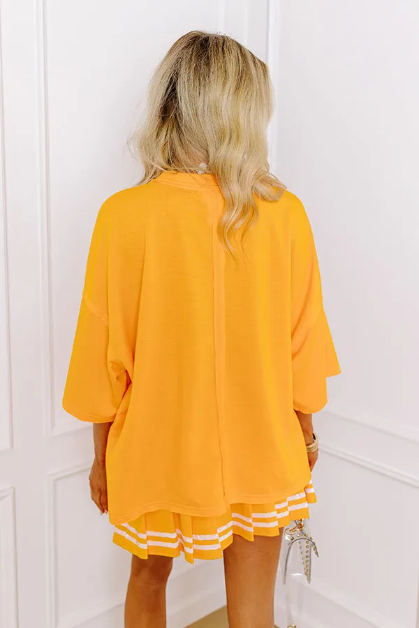 It's a Touch Down Sequin Oversized Tee in Orange sold by Impressions product image thumbnail 5