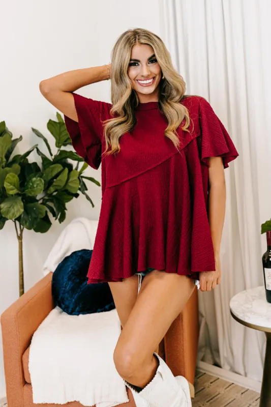 Never Pretend Shift Top In Wine sold by Impressions