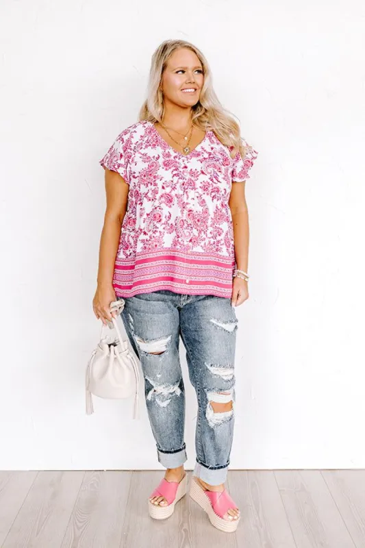 Blossom Boulevard Babydoll Top In Fuchsia Curves sold by Impressions