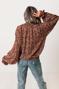 The Winette Floral Top in Rust sold by Impressions