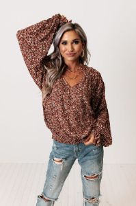 The Winette Floral Top in Rust sold by Impressions