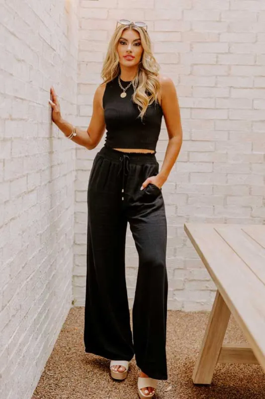 The Araceli High Waist Linen-Blend Pants in Black sold by Impressions