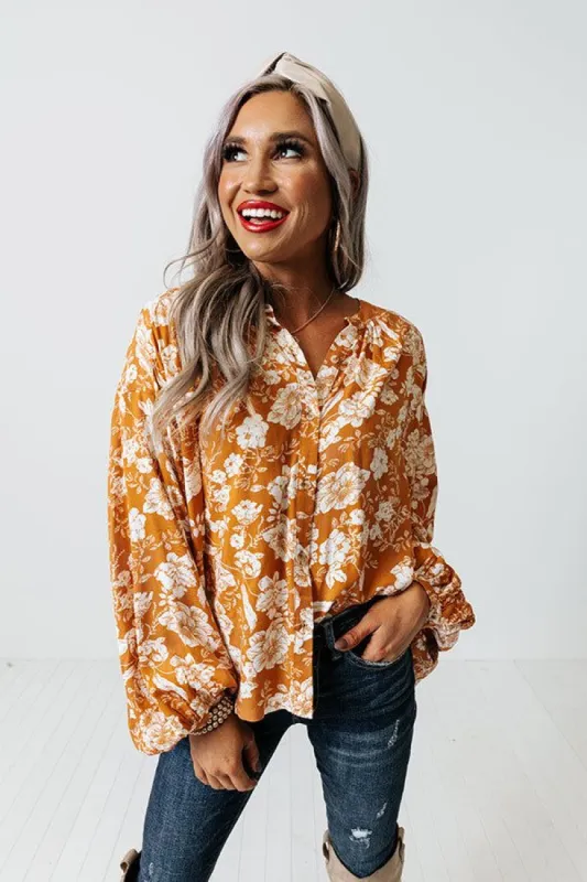 In Harmony Floral Shift Top in Light Rust sold by Impressions
