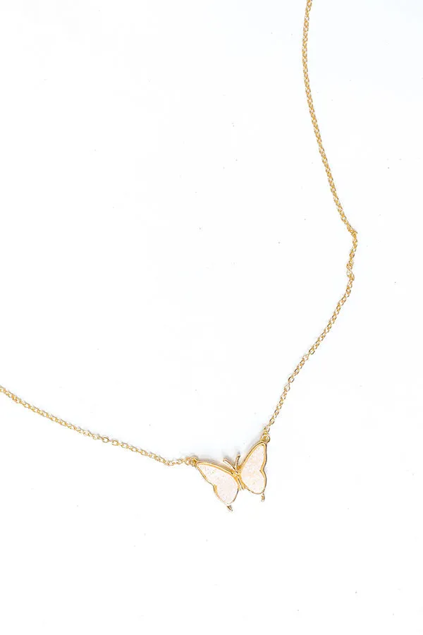 Butterfly Kisses Druzy Necklace in White sold by Impressions
