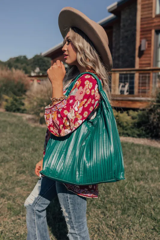 Change It Up Faux Leather Tote In Hunter Green sold by Impressions