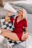 Stay Sophisticated Denim Romper In Crimson sold by Impressions