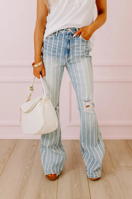 The Rebecca High Waist Distressed Flare sold by Impressions