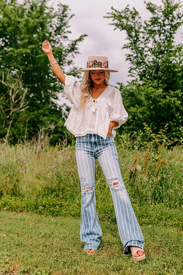 The Rebecca High Waist Distressed Flare sold by Impressions product image thumbnail 4