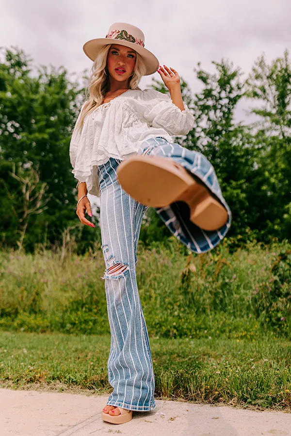 The Rebecca High Waist Distressed Flare sold by Impressions product image thumbnail 5