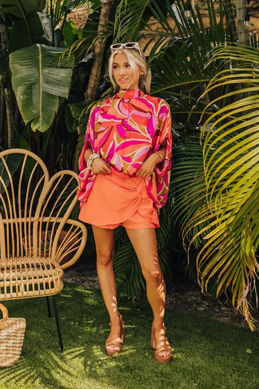 Party On The Go Skort in Orange sold by Impressions
