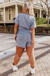 Manhattan Marvels Denim Romper in Medium Wash Curves sold by Impressions