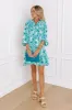 Coastal Cruise Floral Mini Dress in Green sold by Impressions