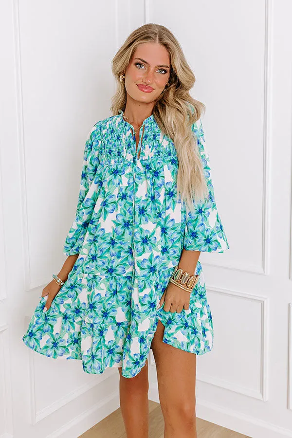 Coastal Cruise Floral Mini Dress in Green sold by Impressions