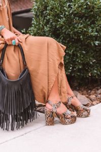 The Bali Platform Heel in Snake Print sold by Impressions