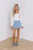 The Olivia Denim Skort in Light Wash sold by Impressions