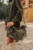 Simply Grand Faux Leather Tote In Army Green sold by Impressions