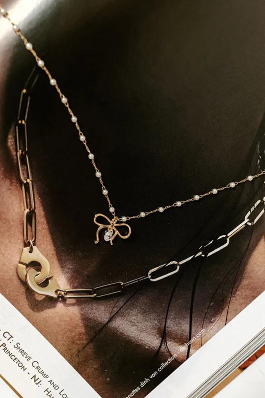 Coquette Charm Necklace sold by Impressions