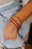 Rhythmic Rhapsody Bangle Bracelet Set sold by Impressions