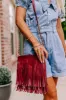 Right On Cue Fringe Crossbody In Aurora Red sold by Impressions