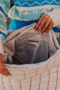 Travel Far Puffer Tote In Beige sold by Impressions