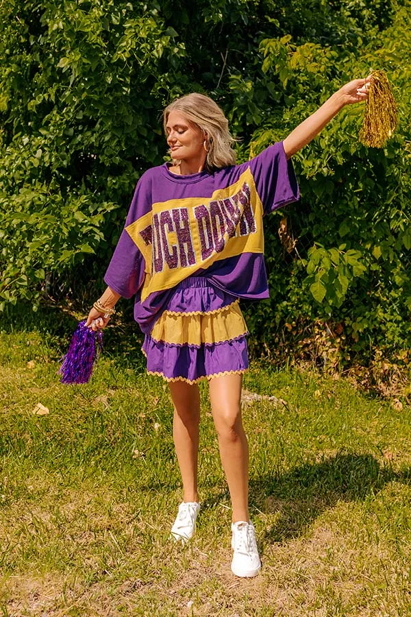 It's a Touch Down Sequin Oversized Tee in Purple sold by Impressions