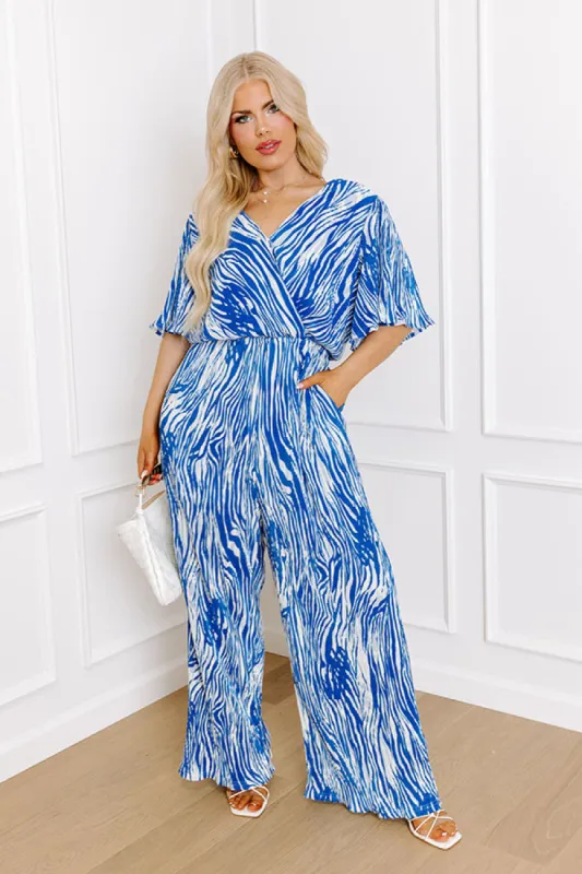 Peak Party Vibes Pleated Jumpsuit In Blue Curves sold by Impressions